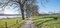 walkway along lake Egglburger See in february, spring landscape upper bavaria near Ebersberg