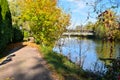 Walkway along loisach river Wolfratshausen, wooden bridge, autumn landscape