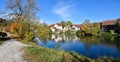 Walkway along Loisach riverside, Wolfratshausen spa town, colorful autumn scenery