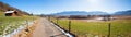 Walkway along moor landscape Murnauer Moos, with a bit of snow and stunning alps view