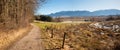 Walkway along Murnauer Moos moorlands, with view to bavarian alps, autumn landscape near Murnau