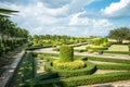 Walkway in beautiful tropical garden landscape in nature city park in summer season sunny day with blue sky white clouds. Royalty Free Stock Photo