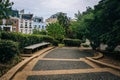 Walkway and bench at Meridian Hill Park, in Washington, DC. Royalty Free Stock Photo