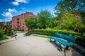 Walkway and bench at Southwest Corridor Park in Back Bay, Boston Royalty Free Stock Photo