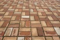 The walkway floor is made of brown clay