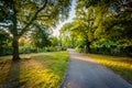 Walkway and gardens at sunset, at Back Bay Fens, in Boston, Mass