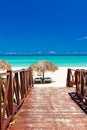 Walkway leading to a tropical beach in Cuba Royalty Free Stock Photo