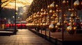 walkway with golden Christmas baubles hanging from above, with a soft focus on the lights and people in the background