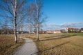 Walkway near Schlehdorf village at early springtime, view to the cloister, bavarian landscape Royalty Free Stock Photo
