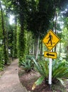 Walkway pathway sign poll to roadside narrow concrete way