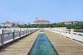 Walkway on a pier with buildings on the background, Yantai, China