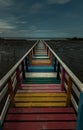 The walkway on Rainbow bridge or Old wood colorful bridge pier Royalty Free Stock Photo