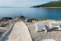 Walkway on the rocky beach in Istria Royalty Free Stock Photo