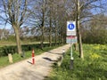 Walkway with sign about measures coronavirus