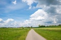 Walkway to famous Andechs cloister in idyllic rural landscape bavaria