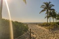 Walkway to Beach With Footprints in the Sand And Ocean in the Background Royalty Free Stock Photo