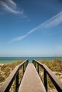 Walkway to an idyllic beach and warm ocean