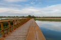 Walkway or wooden bridge over the lagoon of a natural park in Spain Royalty Free Stock Photo