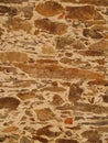 Rustic stone and sand wall Royalty Free Stock Photo