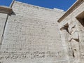 Wall at ancient Egyptian temple of Medinat Habu in Luxor Royalty Free Stock Photo