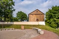 wall of an ancient orthodox church, monument of old brick russian architecture with texture of clay brick, decorated with inserts