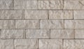 Wall of beige decorative brick Royalty Free Stock Photo