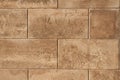 A wall of beige, ochre-colored bricks. Background. Copy Space Royalty Free Stock Photo