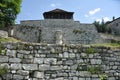 Wall and big stone head