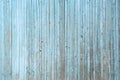 Wall of blue wooden slats. Exfoliated blue paint. Royalty Free Stock Photo