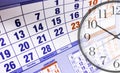 Wall calendar with the number of days and clock Royalty Free Stock Photo