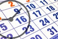 Wall calendar calendar with the number of days and clock close up Royalty Free Stock Photo