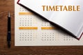 Wall calendar with pen and diary closeup Royalty Free Stock Photo