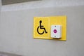 Wall with call button for people with disabilities. Concept for creating accessible areas for people with physical disabilities Royalty Free Stock Photo