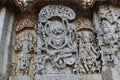 Hoysaleshwara Temple wall carving of Lord Narasimha killing the demon