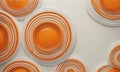 A wall of circles is shown in this image, with some of the circles being orange and white.