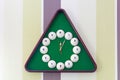 Wall clock in billiards style. Royalty Free Stock Photo