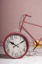 Wall clock built into the bicycle wheel Royalty Free Stock Photo