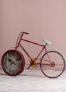 Wall clock built into the bicycle wheel Royalty Free Stock Photo