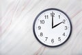 Wall clock show two o`clock on marble texture. Office clock show 2pm or 2am Royalty Free Stock Photo