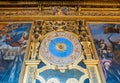 Wall clock with signs of the zodiac in the Hall of the Doge`s Palace in Venice, Italy Royalty Free Stock Photo