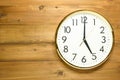 Wall clock on the wooden wall Royalty Free Stock Photo