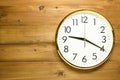 Wall clock on the wooden wall Royalty Free Stock Photo