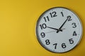 wall clock on a yellow Royalty Free Stock Photo