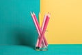 wall colored pastel text space copy concept education surreal creative minimalism background blue yellow pencils Pink