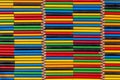 Wall of colored pencils arranged horizontally