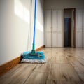 Wall companion Mop casually leans against the quiet wall