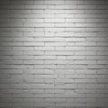 A wall composed of neatly arranged white bricks, forming a rectangular grid pattern. Royalty Free Stock Photo