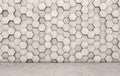 Wall of concrete hexagons and concrete floor. Royalty Free Stock Photo