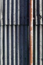 Wall of corrugated asbestos material Royalty Free Stock Photo