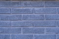 Wall covered with gray decorative brick. Texture of brick wall. Royalty Free Stock Photo